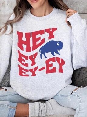 Crewneck Sweatshirt with Red Typography and Blue Buffalo Graphic